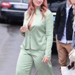 Iskra Lawrence shows off her cleavage as she goes braless in a mint keyhole blouse at Cannes Film Festival Iskra Lawrence shows off her cleavage as she goes braless in a mint keyhole blouse at Cannes Film Festival